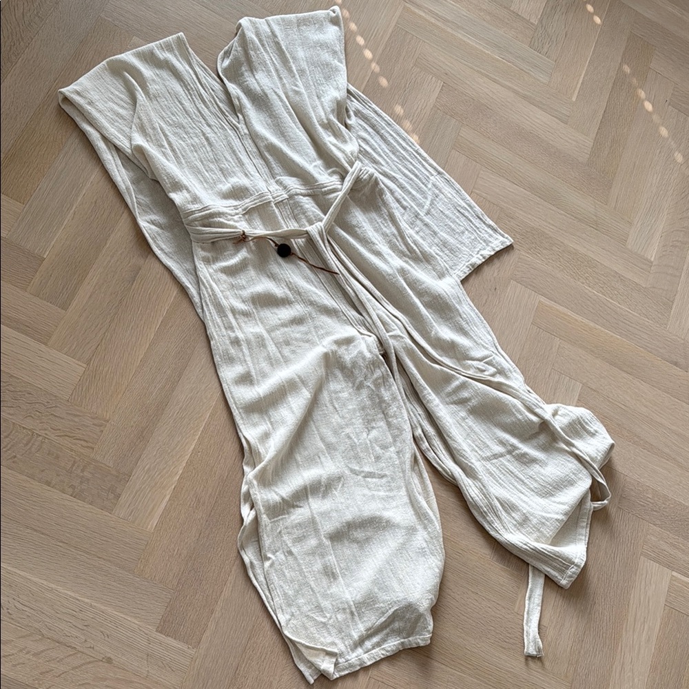 CARAVANA Cape Style Linen Jumpsuit with Side Slits in Pants and Belt. OSFM